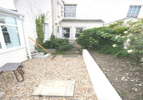 Rear: Split in two levels, the upper mainly laid to lawn and the lower mainly laid to gravel with patio slabs laid.