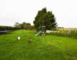 FIELD Accessed from the courtyard is a field which is accessed via a five bar gate. Mature hedging to the perimeters and laid to lawn.