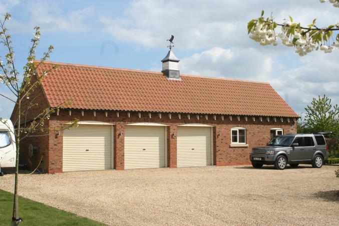 OUTSIDE OFFICE & GARAGE BLOCK TRIPLE GARAGE 30' 0" x 18' 0" (9.14m x 5.49m) LAND With feature roof turret with weather vane.