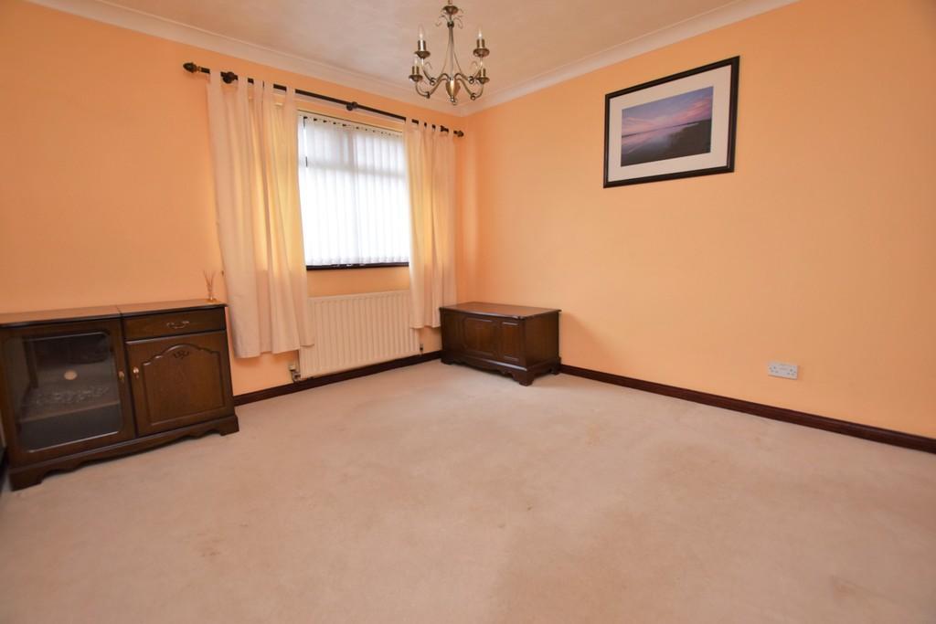 45m) Situated off the lounge with laminate flooring, double glazed windows to two sides, dado rail, double radiator and coving. Door leads to the kitchen. KITCHEN 11' 1" x 8' 0" (3.38m x 2.