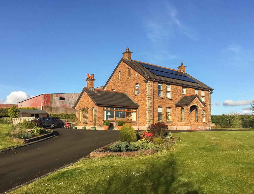 A magnificent detached family home in a superb elevated rural site with exceptional views to the south and west to Lough Neagh and the Sperrin Mountains.