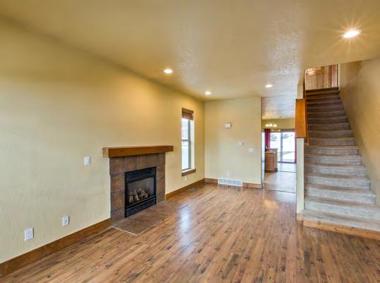 The main floor is bright and sunny with large windows and a spacious floorplan.