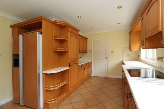 Kitchen/breakfast room 21 x 12 narrowing to 9 Fitted with an extensive range of light wood units with