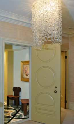 Enter the private elevator VESTIBULE with marble inlay to the elegant CENTER HALL.