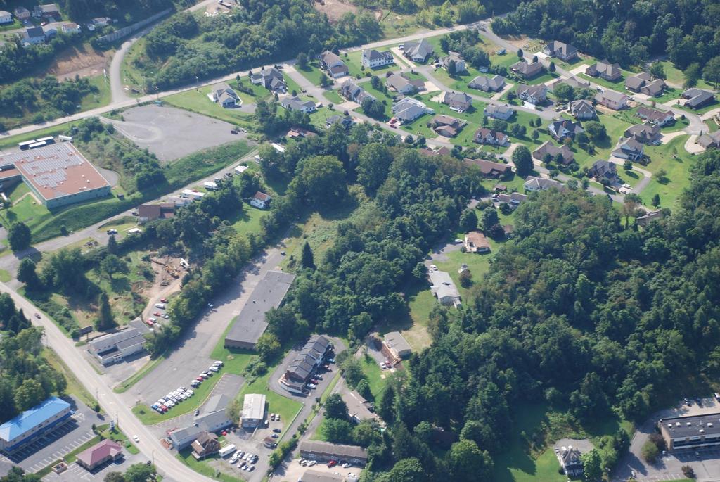 Aerial - Close-Up Showing Location of Site The aerial above was shot in August 2014. This property is adjacent to Sycamore Lanes, West Colony Estates, and Westridge Drive.
