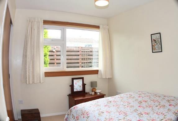 The large window overlooks the rear garden and again has neutral carpet and radiator. Bedroom 4: 2.00m x 3.
