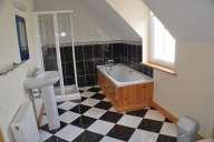 entrance hall, sitting room, kitchen/dining room, guest toilet,