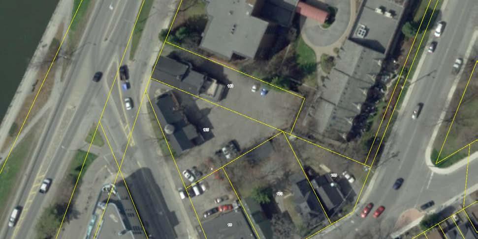 Figure 18. The surrounding rear yards appear to be paved and used primarily for parking. Section 4.