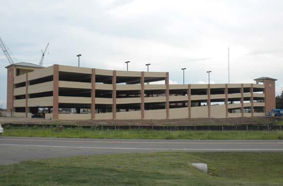 level, 623,000± SF (1,727 spaces) precast concrete parking garage.