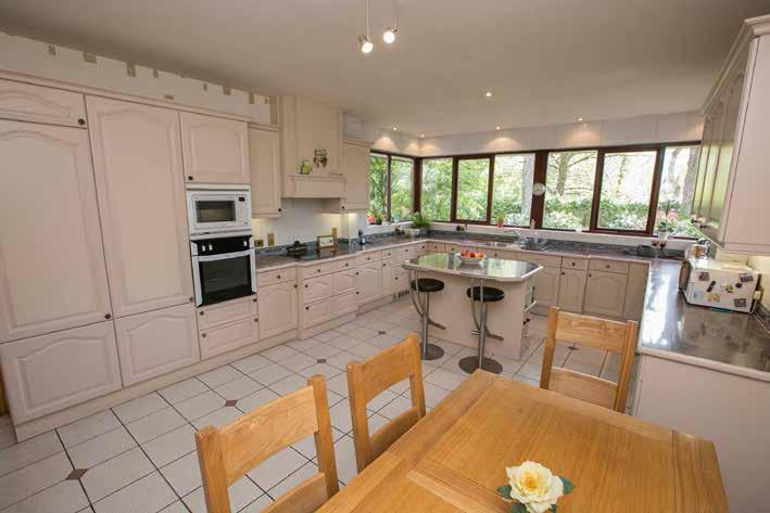 KITCHEN / DINING AREA: 22 2 x 13 10 (6.76m x 4.22m) Excellent range of high and low level units. 1.5 bowl sink unit with mixer tap. 5-ring ceramic hob with extractor over.