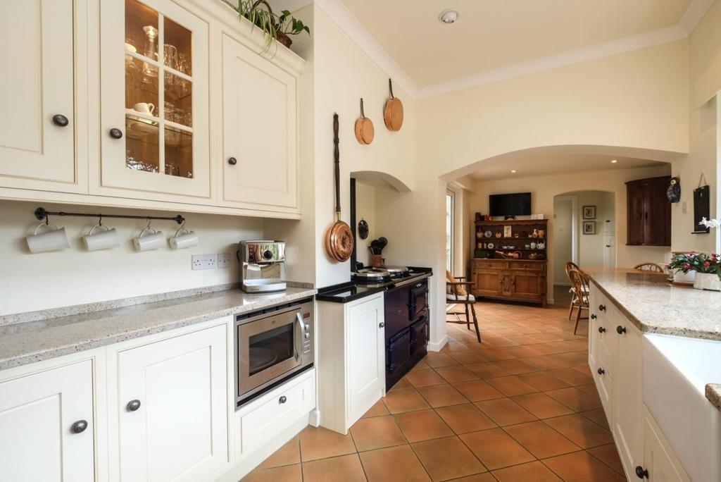 Recess for fridge freezer, integrated dishwasher, AEG microwave oven, oil fired Aga. Open to Breakfast Room. Breakfast Room: 10' 8'' x 10' 0'' (3.25m x 3.