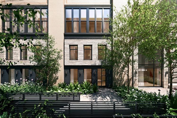 In a former printing house in the West Village, eight maisonettes were consolidated into three much larger three-bedroom units. A rendering of the exterior, above.