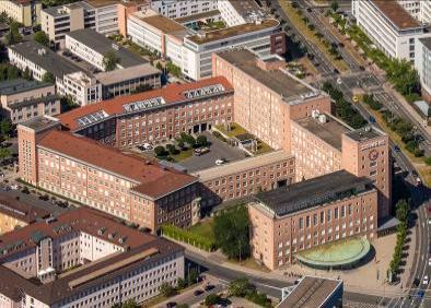 Built between 1948 and 1953, the complex was designed by Hans Hertlein to resemble the brick buildings of Siemensstadt in Berlin. It was the last major building that Hertlein planned for the company.