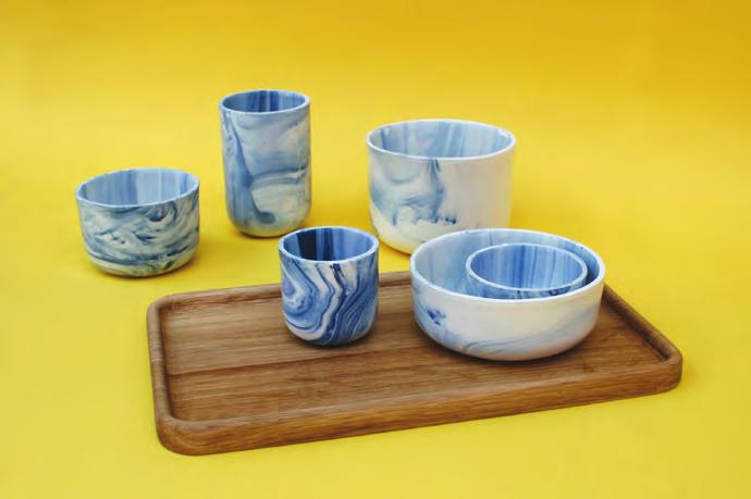 Marbled ceramic containers by Sara Wright