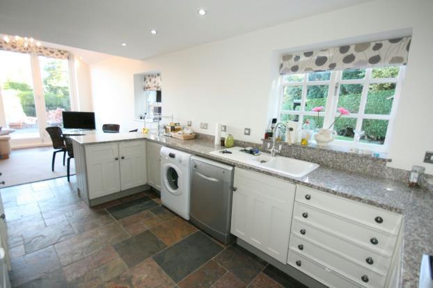 Kitchen with bi-folding doors onto the Gardens, a small