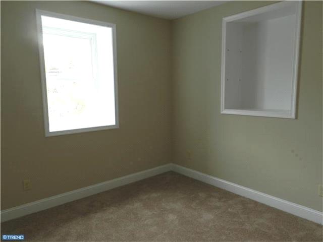 The first level offers Living room, Dining room & Kitchen w/ hardwood floors;