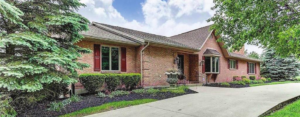 6576 5K AVE $474,900 Absolutely gorgeous full brick custom built 7,898 sq ft home just East of Greenville on a well manicured lot with amazing sunset views from the back brick paver patio area.