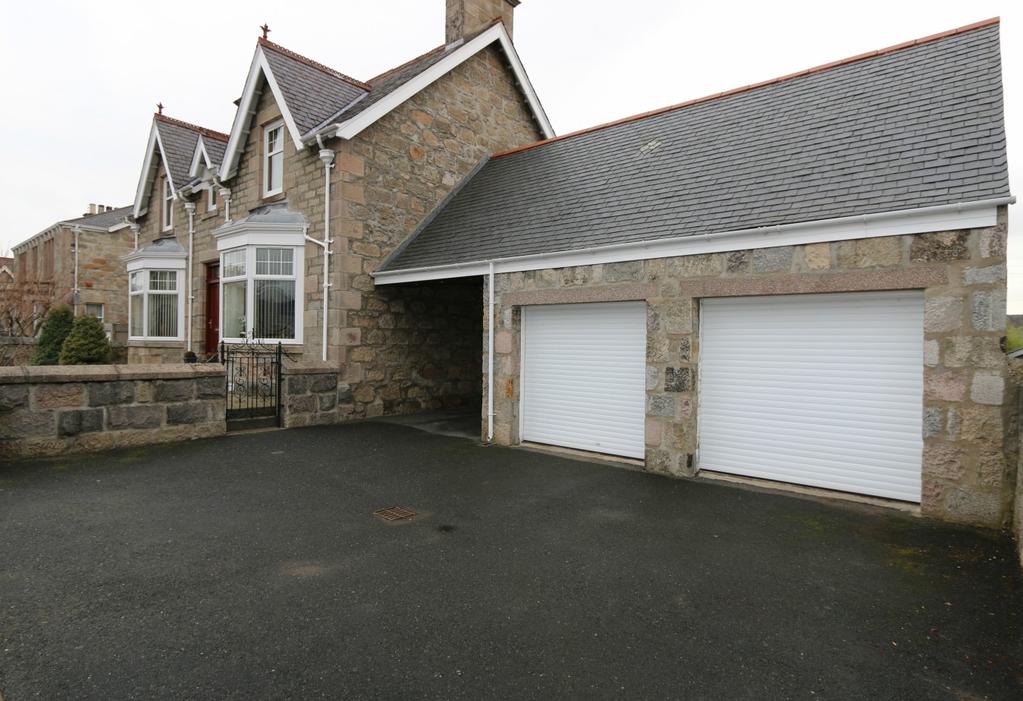 53m or thereby The Double Garage has metal roller shutter doors