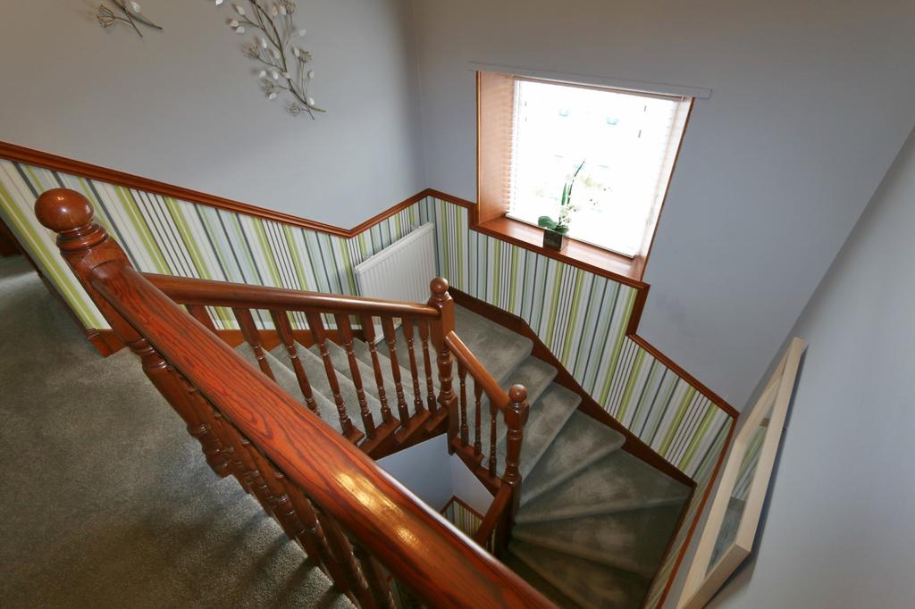 stairs leading down to the Basement.