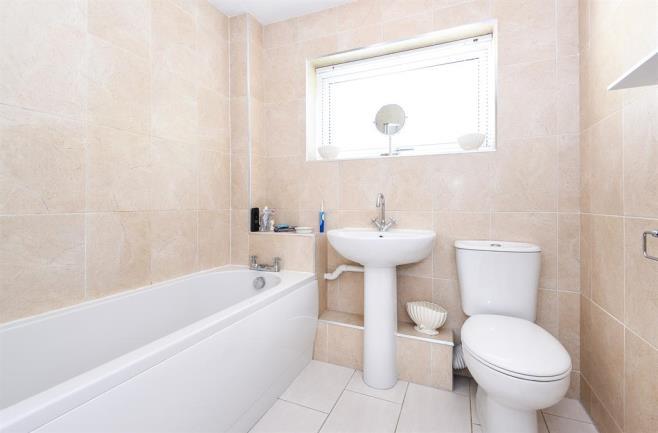 06m (6' 9") This single bedroom looks out over the rear garden, has a double glazed window and central heating radiator. There is laminate flooring in the bedroom. CONSERVATORY 2.