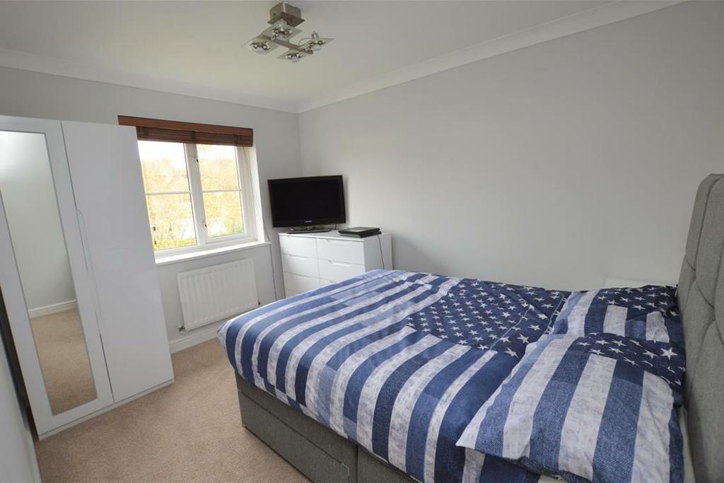 The rear garden measures approximately 55ft x 35ft commences with a paved area, with the
