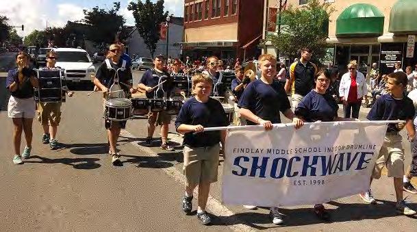 Page 7 SHOCKWAVE Marches in Findlay 4th of July Parade This past July SHOCKWAVE, Findlay MS Indoor Drumline marched in the Findlay 4th of July Parade.