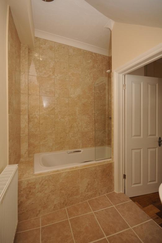 Bathroom 12 2 x 5 0 Bathroom suite comprises of a inset bath with mixer tap and shower attachment,