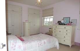 Also on the First Floor is Bedroom Four with a range of fitted wardrobes and En Suite Shower Room having a white suite and chrome heated towel rail.