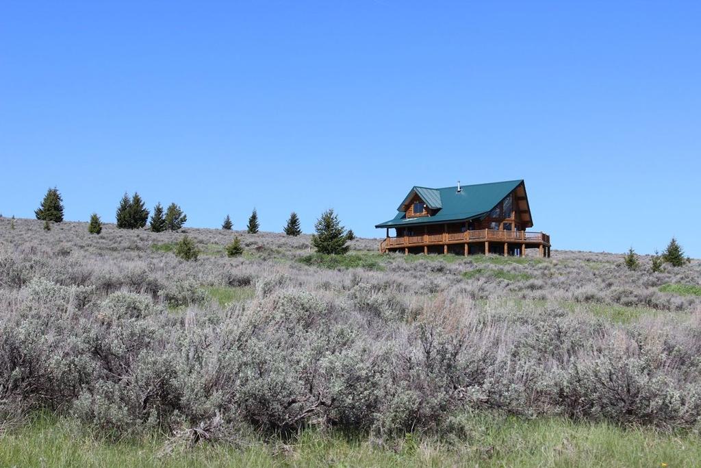 rustic & HIGHLIGHTS: Acreage: 20 acres All 6 corners are marked Home is approx.