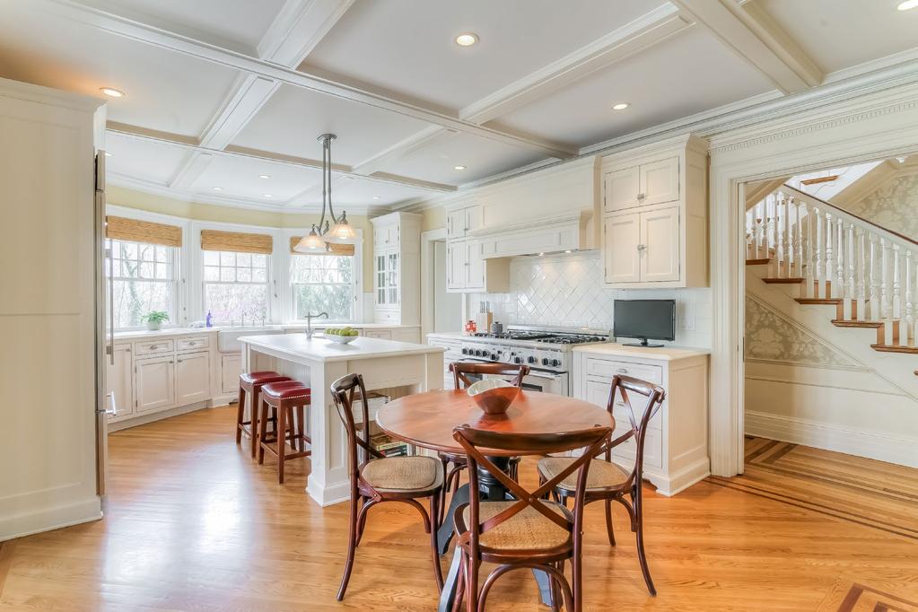 The heart of this home is its stunning gourmet kitchen with professional grade appliances,