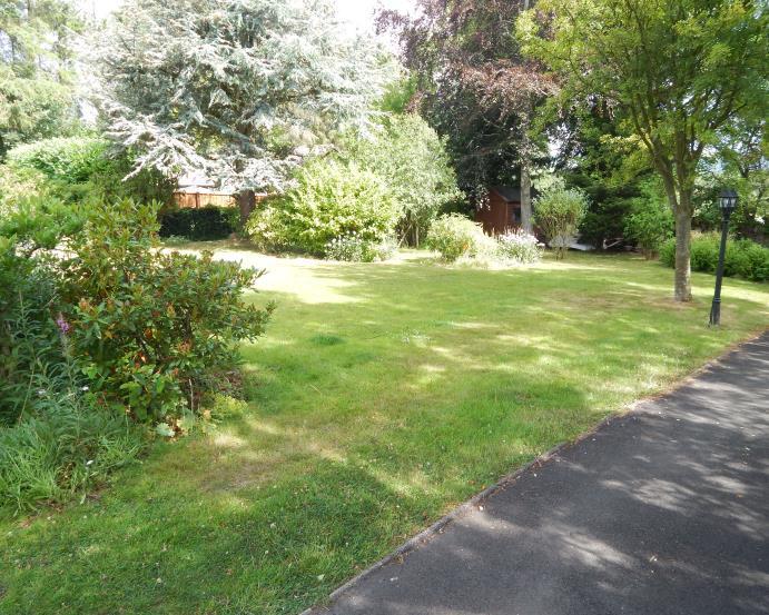 EXTERNAL GARDENS There are good sized areas of garden ground to front and rear; the front garden, which is particularly spacious, is laid primarily to grass with many fine mature shrubs and trees