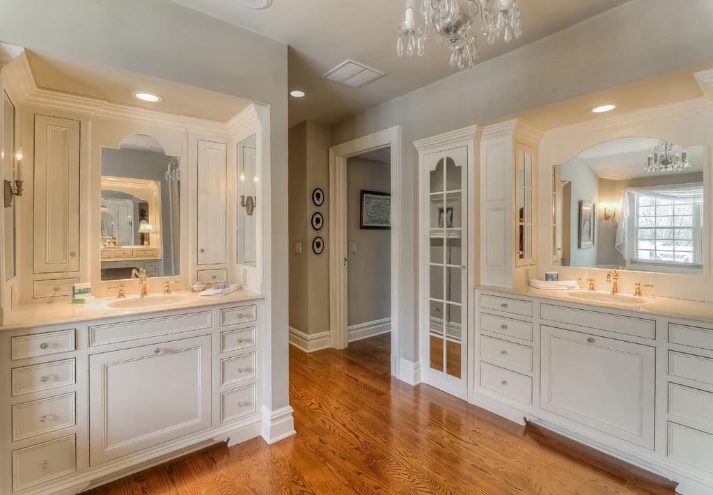 views over property French door to terrace Dressing rooms with multiple walk-in closets with custom built-ins Cedar closet Sound system Master Bath: Luxurious Master Bathroom with double vanities