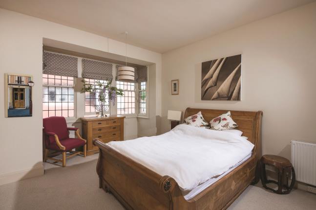 BEDROOM THREE (rear facing) 20ft 9 x 15ft 5 (6.32m x 4.69m) A light and bright room with large dormer with three sash windows overlooking the rear gardens and central heating radiator.