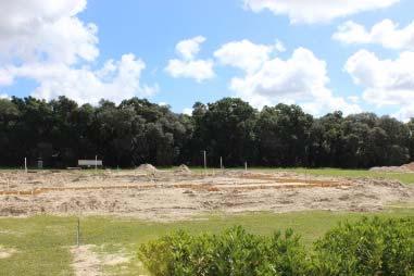View looking east on property to new project area. View looking west on subject property. View of existing church.