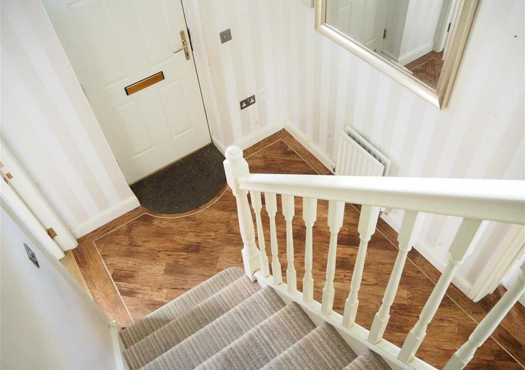 The property benefits from its location, large driveway, double garage, gas central heating and upvc double glazing.
