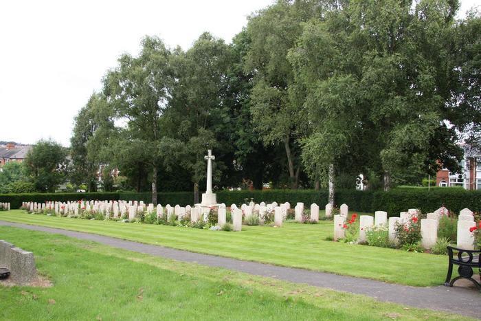 Exeter Higher Cemetery showing Cross of Sacrifice & World