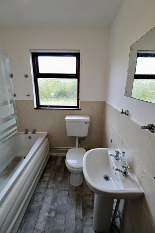 Bathroom: comprising; panel bath with