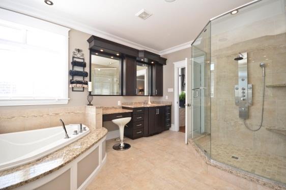 The large walk-in closet is just off the ensuite bathroom and offers plenty of built-in cabinetry.