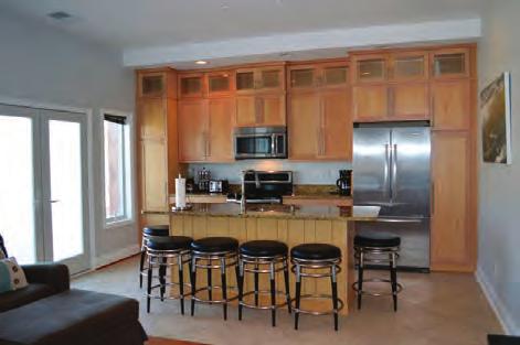 Well-equipped, galley-style kitchen that opens up to the living and dining area. This condo does not have a washer or dryer.