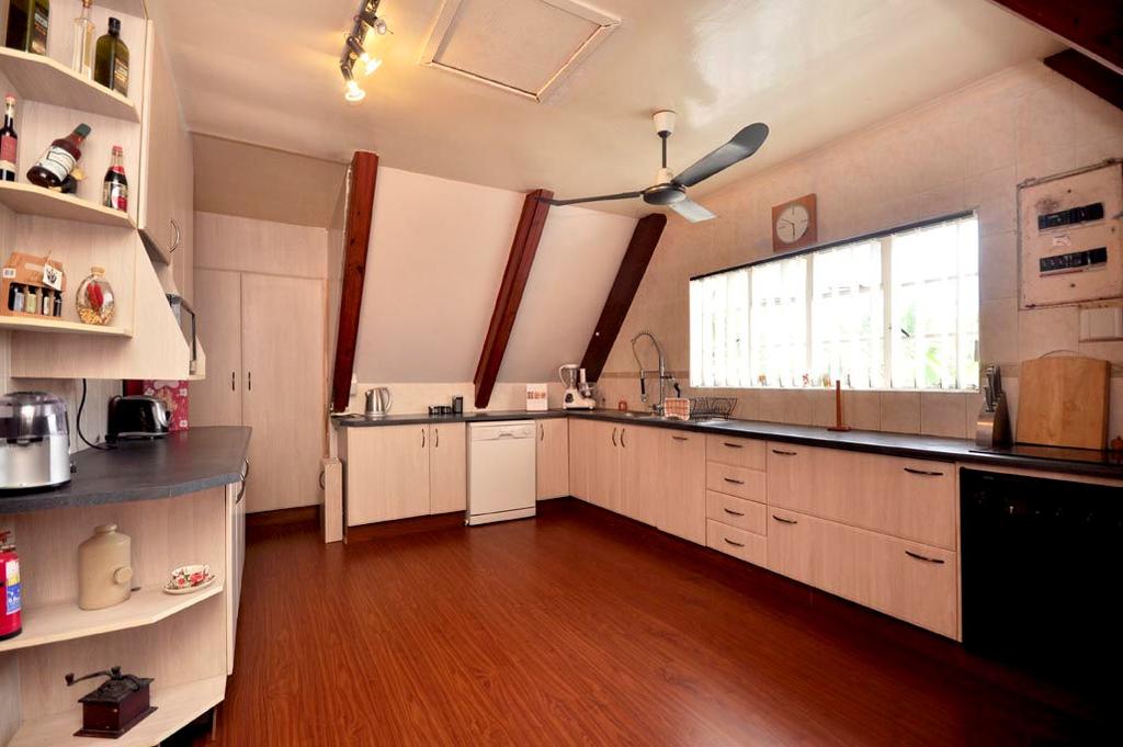 65m Kitchen This neat fitted kitchen is located on the ground floor and has ceramic tiled flooring.