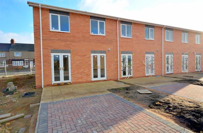 EXTERNAL This development offers each property a spacious driveway and an enclosed garden to the rear.