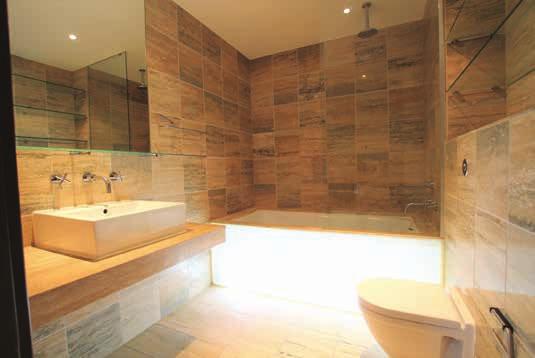 3.50m x 3.1m with range of built-in wardrobes, oak wooden flooring Bathroom: 2.7m x 2.