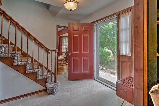 Foyer / Hall 14 X 9: Warmth and ease surround you as you enter this gracious home.