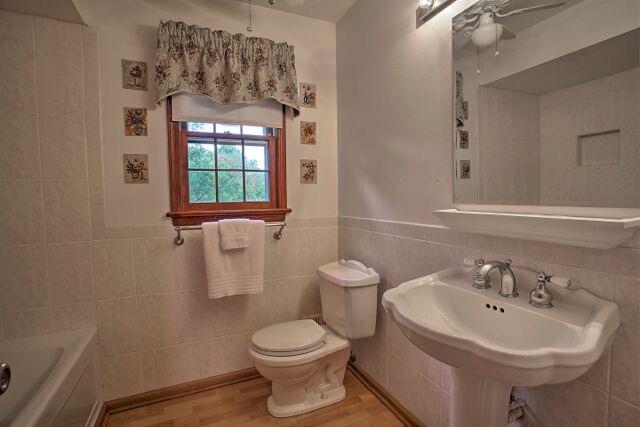 The renovated guest bath is light and bright