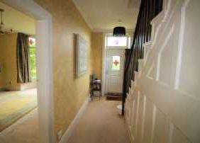 Boasting gas central heating, double glazed, comprising of: reception hallway, cloak room/w.