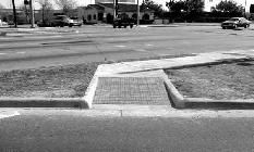 Curb ramps: Two are required at either end of the crosswalk.