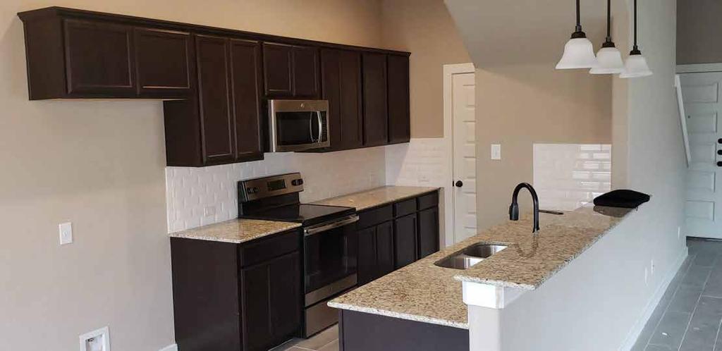 Kitchens have islands in the kitchen, granite countertops, deep