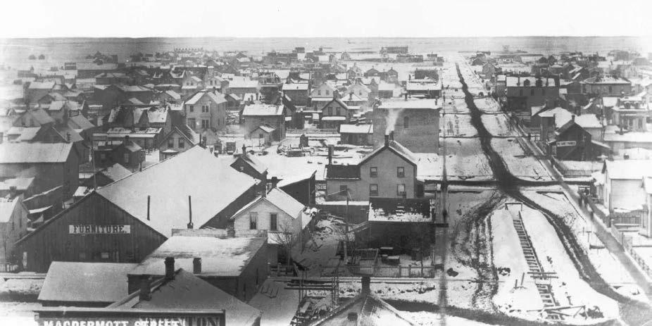 Plate 1 McDermot Avenue looking west from Main Street, ca.1881.