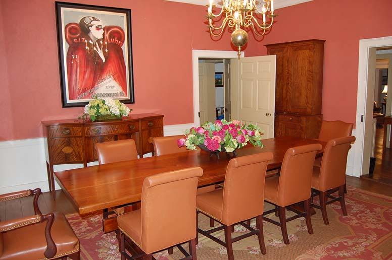 The formal dining room, accessed from the center hall or from the second foyer, is an impressive space with room