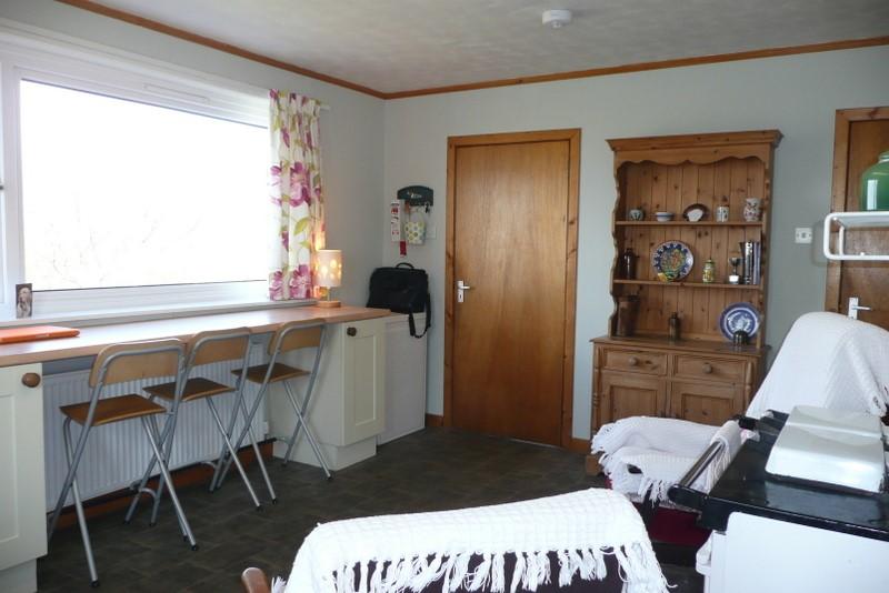 Kitchen 16 7 x 13 0 Bright and spacious kitchen with a large picture window to the rear of the